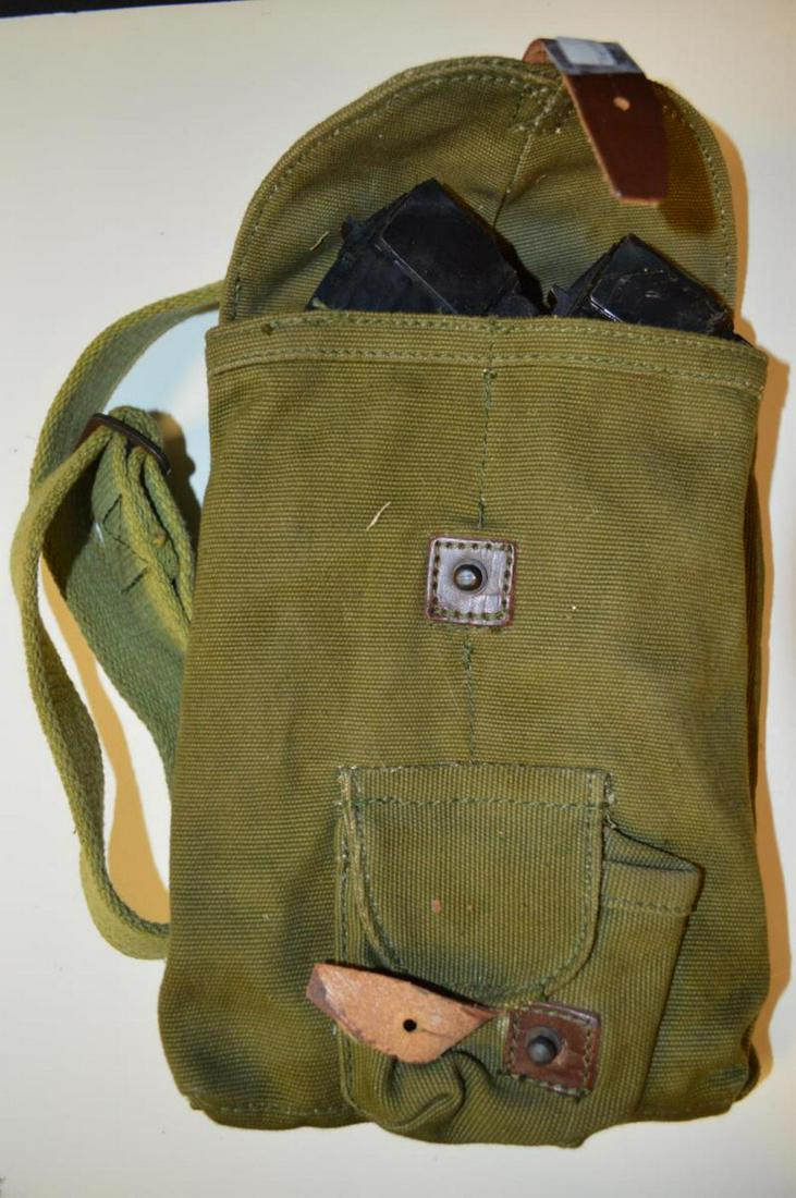 Lot 3 Metal 40 Round AK-47 Magazines Canvas Case: Lot of 3 Metal 40 Round AK-47 Magazines in Heavy Canvas Belt Loop Case. Double stacked, standard pattern 7.62 x 39. All are in excellent condition. One is marked East Germany.