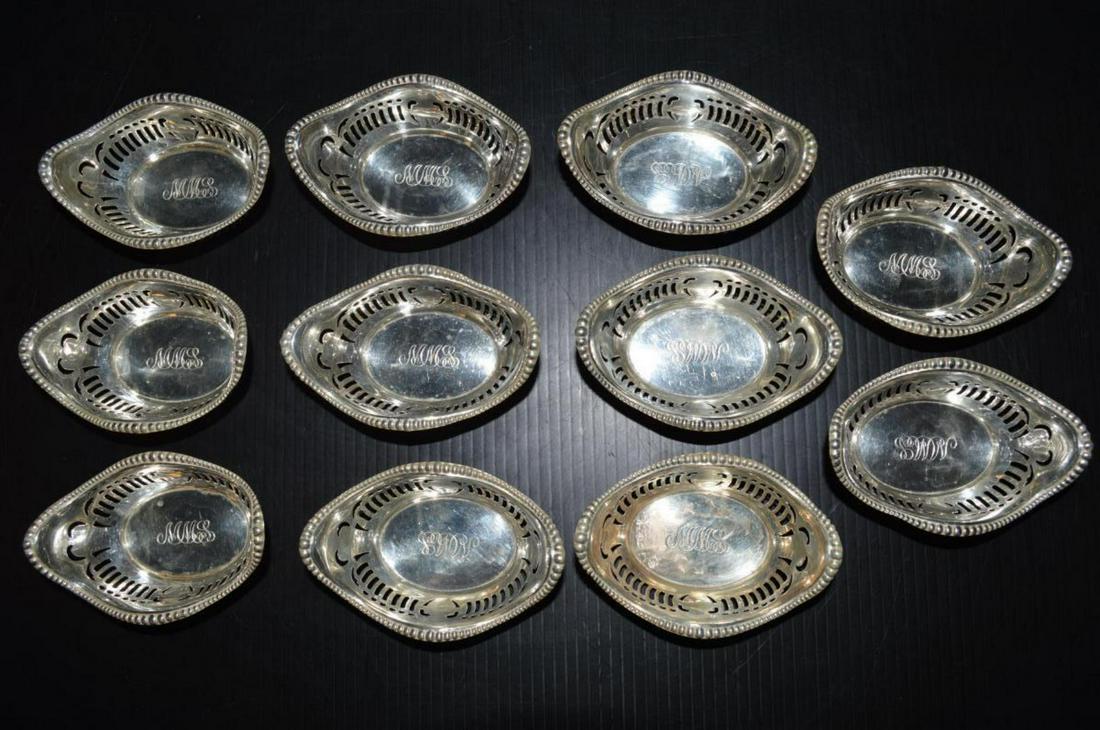 Eleven Sterling Silver Nut Dishes: Eleven Sterling Silver Nut Dishes. Pierced dishes by Gorham, 1 1/4"h. 7.5 oz.t.