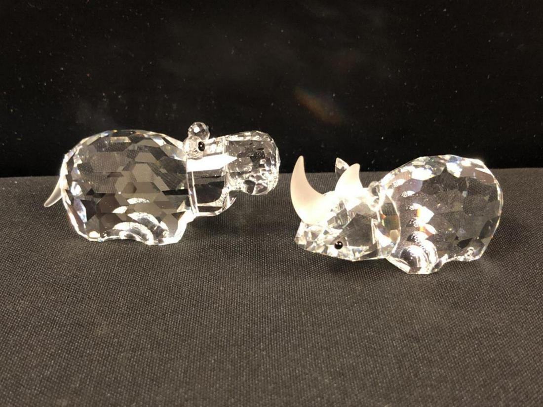 Swarovski Crystal Rhinoceros and Hippopotamus: Swarovski Crystal Rhinoceros and Hippopotamus. Classic quality collectible figurine for home & office decor. Excellent condition. Made in Austria. No tube or COA, just the figurine.