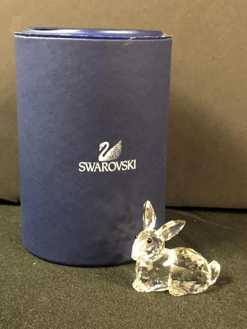 Swarovski Lying Rabbit Hare #905778 w/Tube: Swarovski Lying Rabbit Hare #905778 with original tube. Classic quality collectible figurines for home & office decor. Made in Austria. Excellent condition.