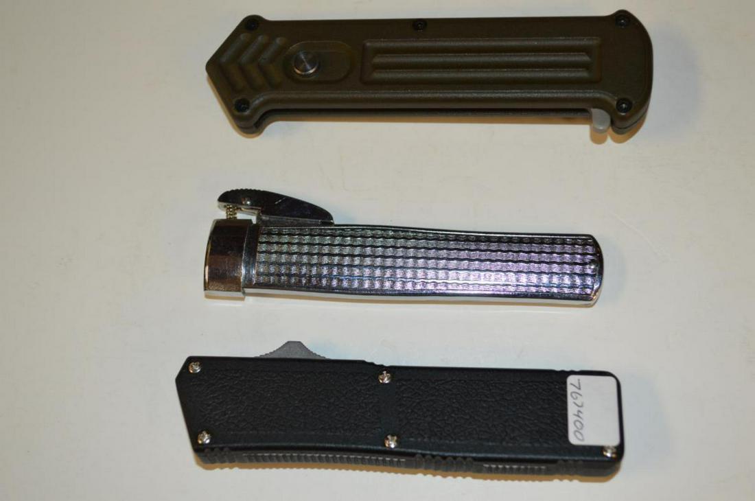 Group of Three Interesting OTF Knives: Group of Three Interesting OTF Knives All with Original Edges. This lot will include, 1-Replica of the Edge Co silk ripper paratrooper Eagle stainless steel gravity knife 3 1/4". 1-Lightning automatic