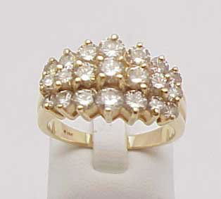 Lady's triple row Diamond Fashion Band: 14K yellow gold triple diamond row lady's fashion band 5.60 grams. There are 21 round full cut diamonds ranging from ,04 cts to .10 cts weighing approx 1.52 cts tw, M-N, SI1-SI2. Ring size is 6 ¾.