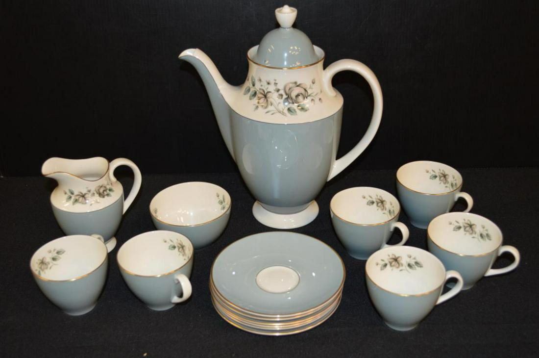 Royal Doulton Tea Set, Rose Elegans Pattern: Royal Doulton Tea Set, Rose Elegans Pattern. Tea pot, 10"h., creamer, 4 1/2"h., open sugar, 2"h. and six cups/saucers, 2 1/2"h. 5"dia. Small chip on the teapot lid's finial.