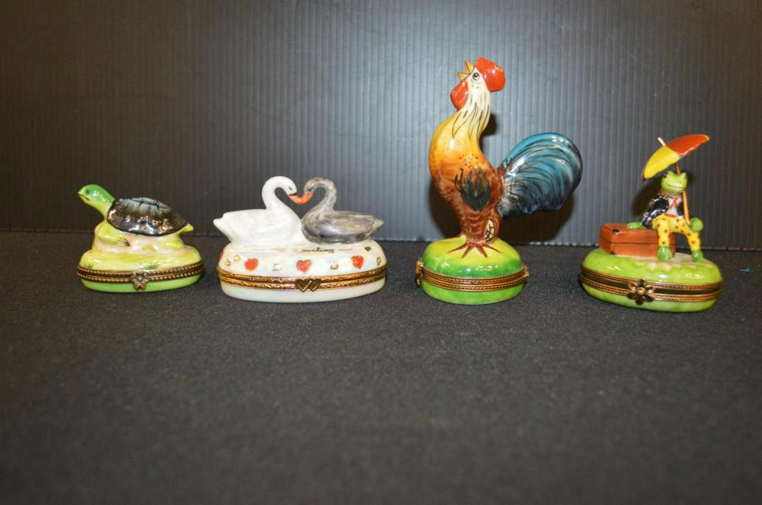 Group of Limoges France Porcelain Trinket Boxes: Group of Limoges France Porcelain Hand Painted Trinket Boxes. This lot will include a Turtle, Rooster, Frog & Swans with heart necks. The turtle is 2 1/4" & is labeled in the bottom lid with a scene o