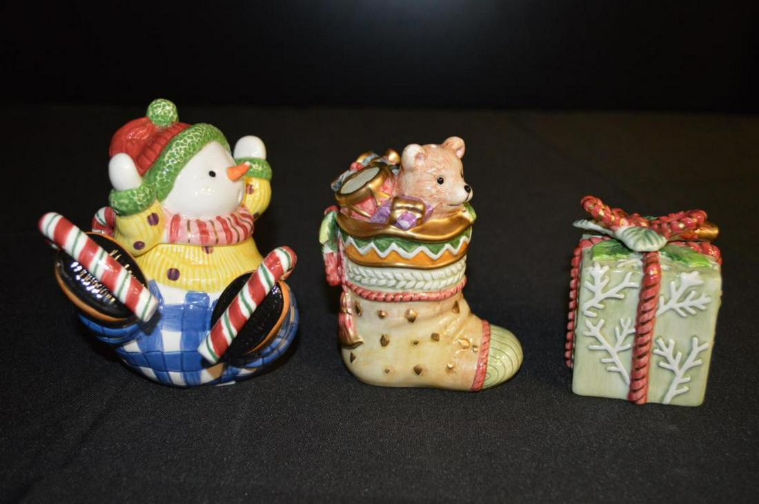 Trio Fitz Floyd Winter Holiday Christmas Service: Trio of Fitz & Floyd Winter Holiday Christmas Service Porcelain. Lidded snowman sugar bowl with candy cane spoon, Christmas package salt shaker & overflowing stocking pepper shaker. All marked on the 