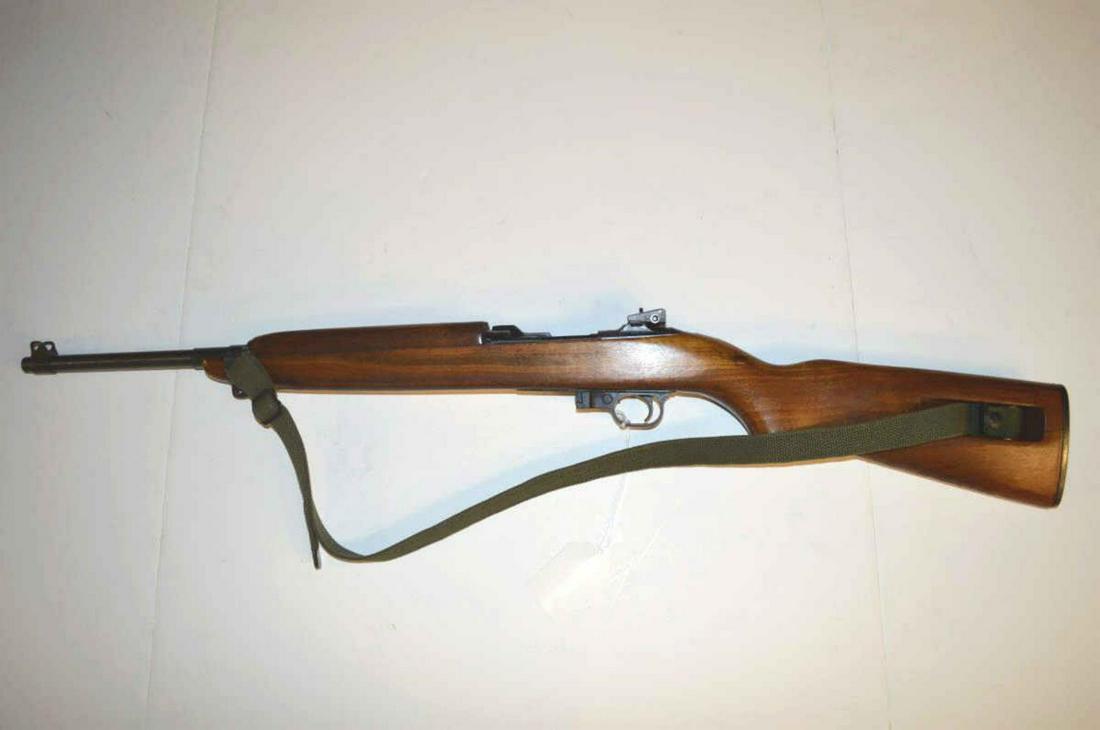 Universal M1 Carbine .30 cal. Semi Auto Rifle: Universal M1 Carbine .30 cal. Semi Auto Rifle. G.I. copy 18" barrel, canvas sling. Walnut two piece stock. Adjustable rear sights, Screw-on front sight band. Serial # 121570 Unique personal ID # engra