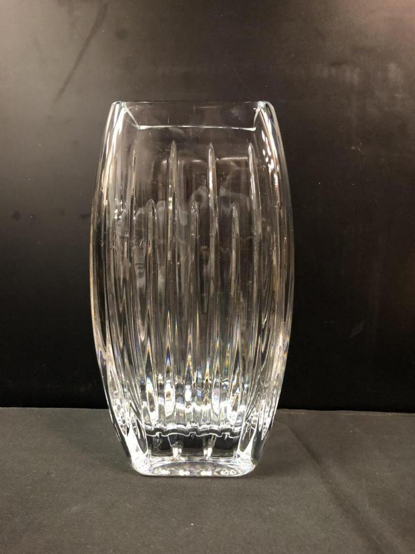 Miller Rogaska Cut Crystal Square Table Vase: Miller Rogaska Cut Crystal Square Table Vase. Measures 10" tall and has a base of 3.5" x 3.5". It is 5.25" at its widest. Etched Miller Rogaska on the bottom. No chips, nicks or scratches noted.