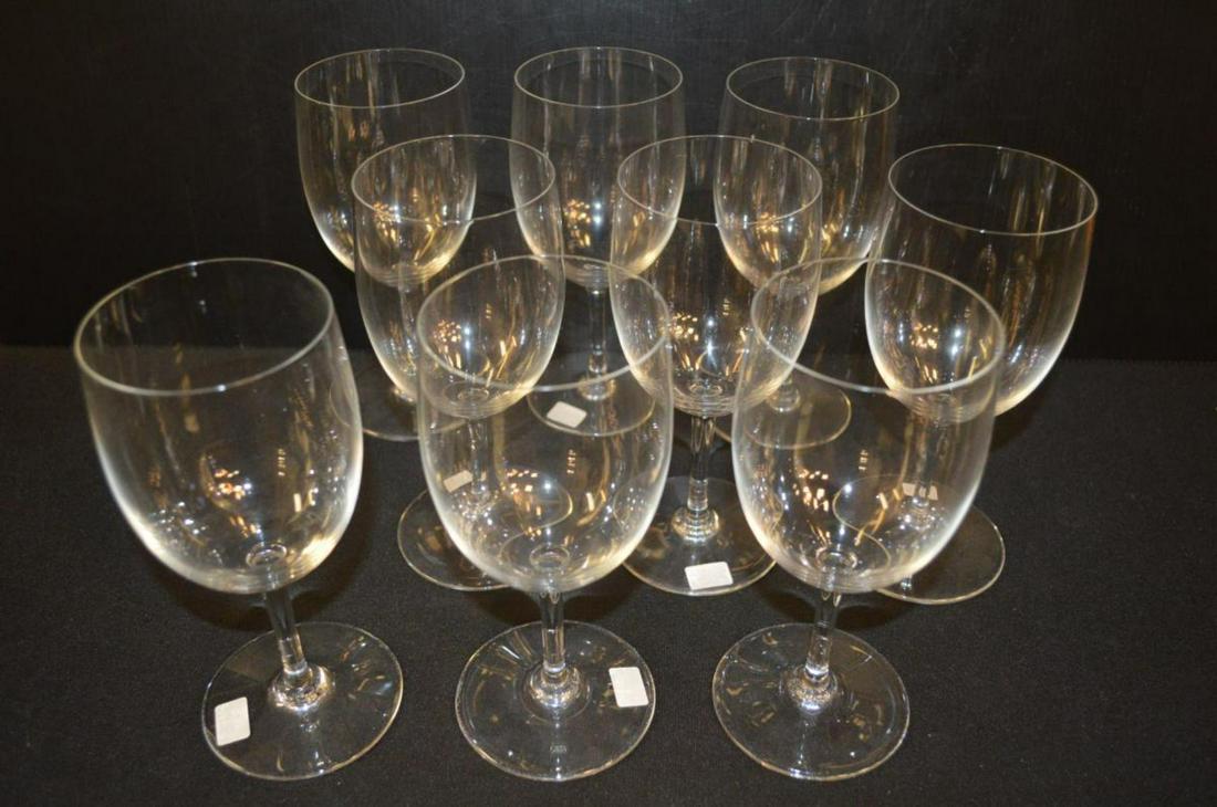 Set of 9 Clear Crystal Baccarat Water Goblets: Set of 9 Clear Crystal Baccarat Water Goblets 7 1/8" tall & 3" diameter. Excellent condition & all are marked with the acid etched logo from the Baccarat Co. Made in France. Round stem.