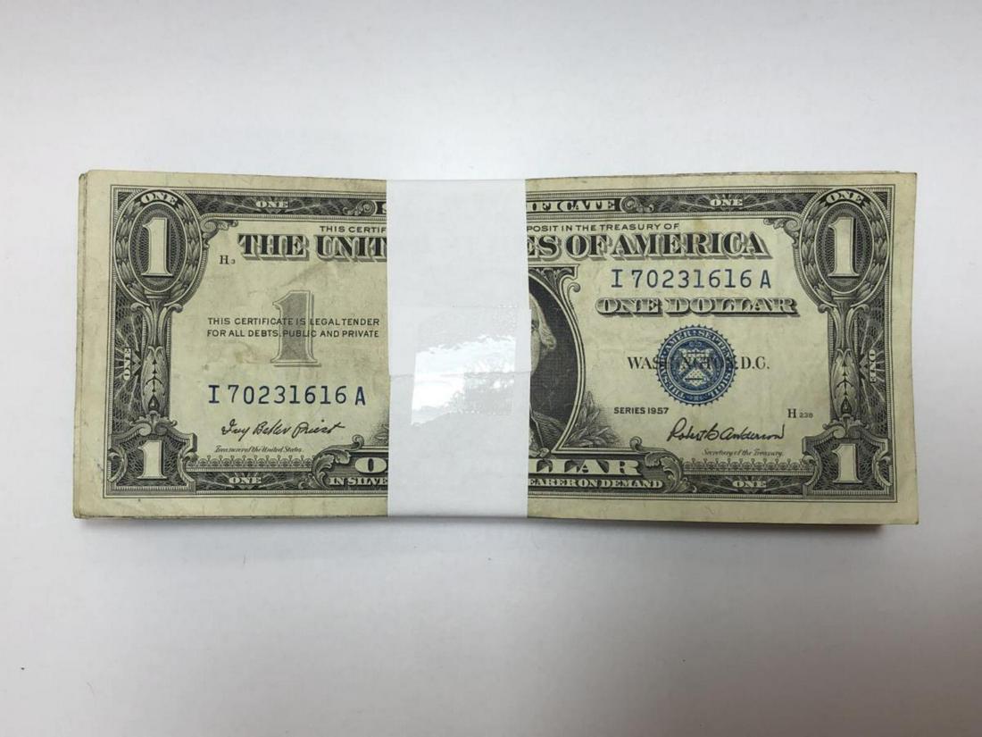 Bundle of 100 Series 1957 $1 Silver Certificates: Bundle of 100 Series 1957 $1 Silver Certificates that are in average circulated condition. Consists mostly of Series 1957, 1957-A, 1957-B, and 1957-E