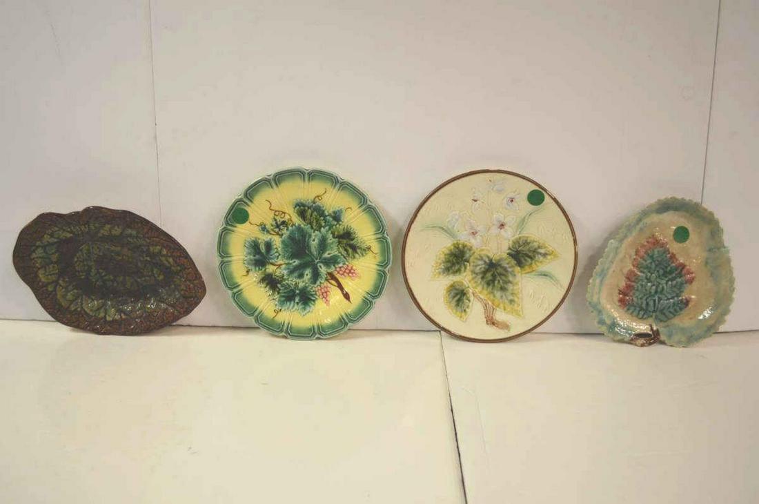 Four Majolica Plates Including Sarreguemines: Four Majolica Plates Including Sarreguemines. All with foliate decoration and two leaf shaped, one stamped for Sarreguemines, 6 1/2" to 8"l. One has roughness in the glaze.