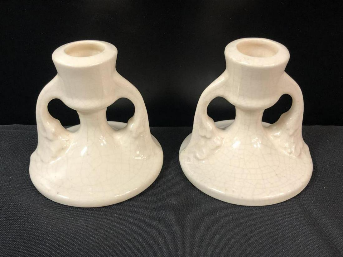 Pair Of Tuscany Style Candle Holders: Pair Of Tuscany Style Candle Holders. Porcelain candles stand 3 1/2" tall. has crazing look through out the candle holders.