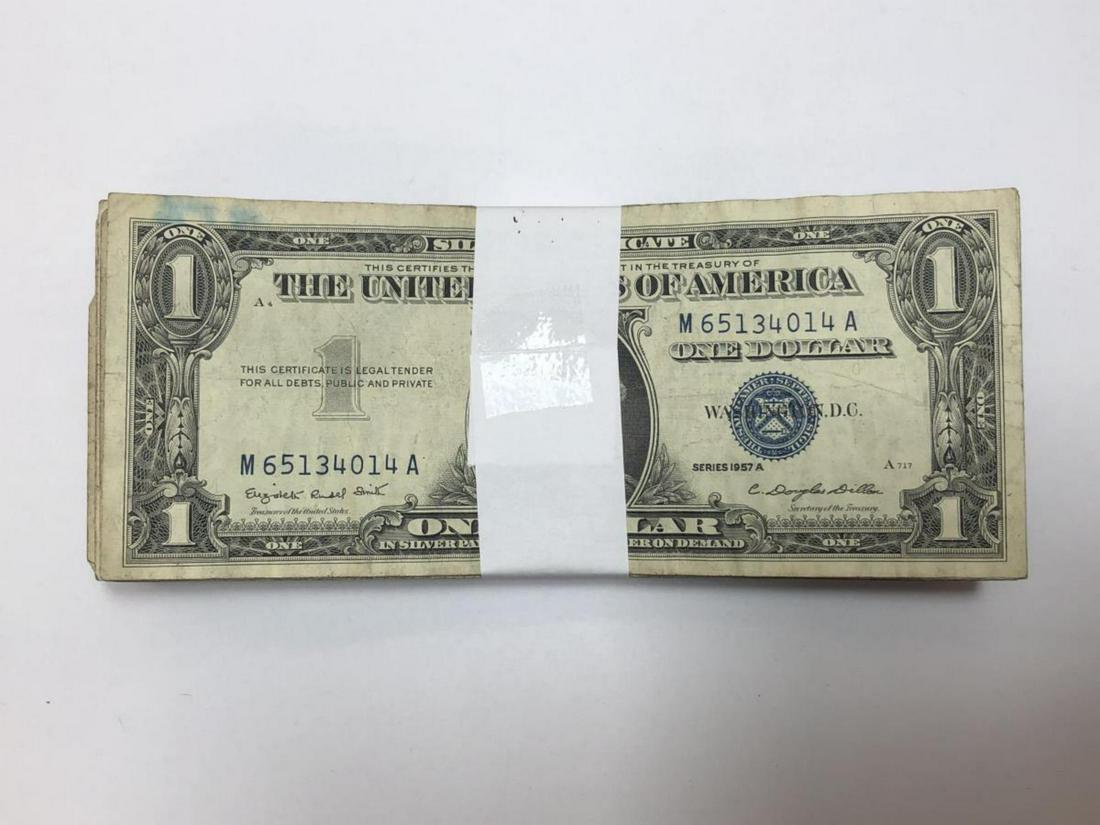 Bundle of 100 Series 1957 $1 Silver Certificates: Bundle of 100 Series 1957 $1 Silver Certificates that are in average circulated condition. Consists mostly of Series 1957, 1957-A, 1957-B, and 1957-E