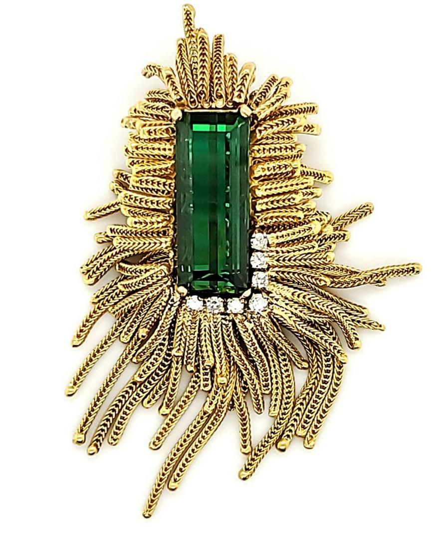 18kt yellow gold tourmaline and diamond pendant: Ladies 18kt yellow gold tourmaline and diamond pendant featuring acid tested 18kt yellow gold tassels surrounding prong set rectangular step cut green tourmaline measuring 21.2x8.5x7.3mm and weighing 