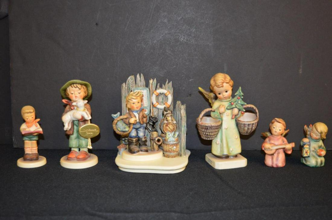 Lot Of Hummels: Lot Of Hummels. Total of 6 Hummels in the lot. Consists of Goebel Hummel Guiding Light. Goebel Hummel Serenade. Honor Student. Christmas Angel. Lost Sheep. The Hummelscapes Collection Fisherman Feast.