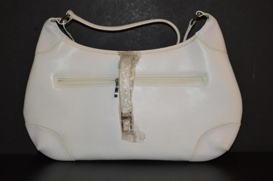 Swarovski Ladies White Leather Purse & Compact: Swarovski Ladies White Leather Purse with Silver Tone Hardware & Crystal Encrusted Closure Strap. Included with this purse is a silver tone square compact & a three compartment trinket holder, both in