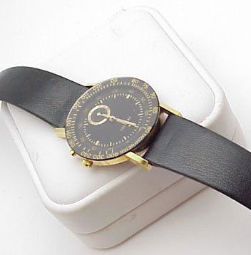 Gent's Movado tachometer watch: Gent's Movado Swiss made quartz tachometer watch has small second hand dial and black leather band. Needs battery.