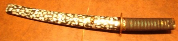 Japanese Tanto Sword Conch Shell Saya: Japanese Tanto sword with conch shell saya, interesting hamon; sword 18 3/4 long; blade 11 3/4""