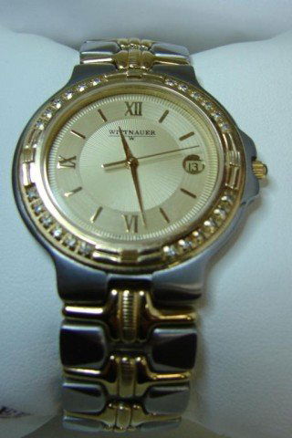 Man's Swiss Wittnauer Quartz wristwatch, two tone: Man's Swiss Wittnauer Quartz wristwatch, two tone stainless steel with original box.