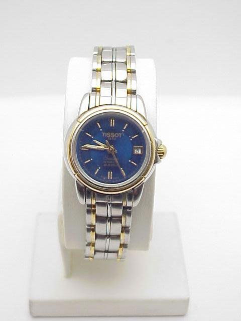 Lady's stainless Tissot estate automatic watch has: Lady's stainless Tissot estate automatic watch has 25 jewel movement and blue dial. Is in very good condition.