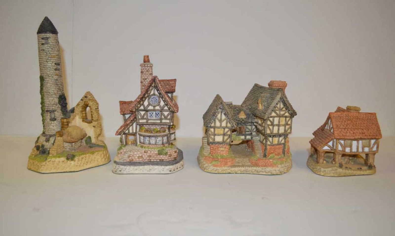 Lot Of David Winters Cottages: Lot Of David Winters Cottages. Total of four cottages in the lot. Consists of Little Market By David Winter. Tudor Manor House By David Winter 1982. David Winter Cottages Collectors Guild Thameside Co