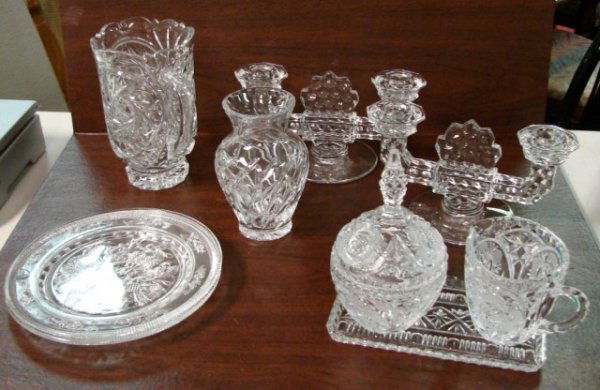 Vintage Crystal incl. Star of David Pitcher: Box lot consisting of pair of vintage glass candelabra, a crystal Star of David pitcher, crystal sugar and creamer with an underplate, small crystal vase, 2 Orrefors crystal plates. No chips, cracks o