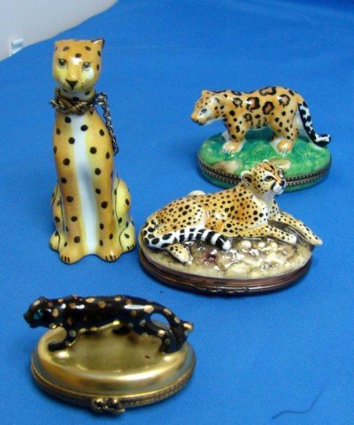 3 Limoges Boxes & 1 Halcyon Days Box - all Cats: Lot of 3 Limoges boxes, a tiger and a black panther, no chips, and a standing cheetah that has a missing ear and another small chip, and a Halcyon Days cheetah box, no chips; All signed.