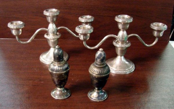 2 Sterling Silver 3 arm Candelabra & salt & pepper: Pair of weighted sterling silver candelabra with removable arms and a pair of weighted sterling salt and pepper shakers.