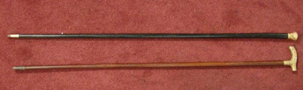 Two vintage walking canes with brass heads: Two vintage walking canes with brass heads