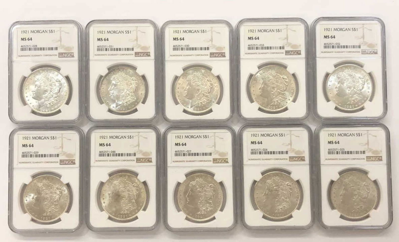 Dealer Lot of 10 1921 Morgan Silver $1 NGC MS64 (1 of 2)