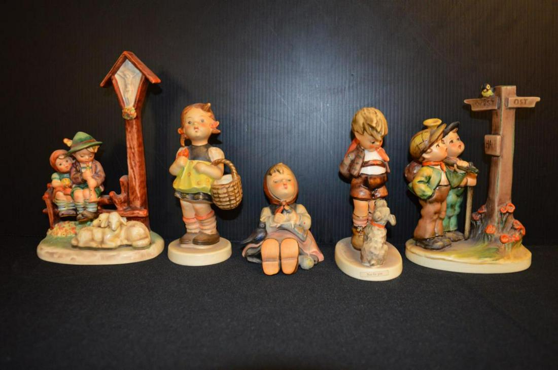 Lot Of Hummel Figurines: Lot Of Hummel Figurines. Total of 5 figurines in the lot. Consists of Sister #98 Tmk 3. Stands 5 1/2" tall. Crossroads #331 Tmk 5. Stands 6 3/4" tall. Not For You #317 Tmk 5. Stands 6" tall. Wayside D