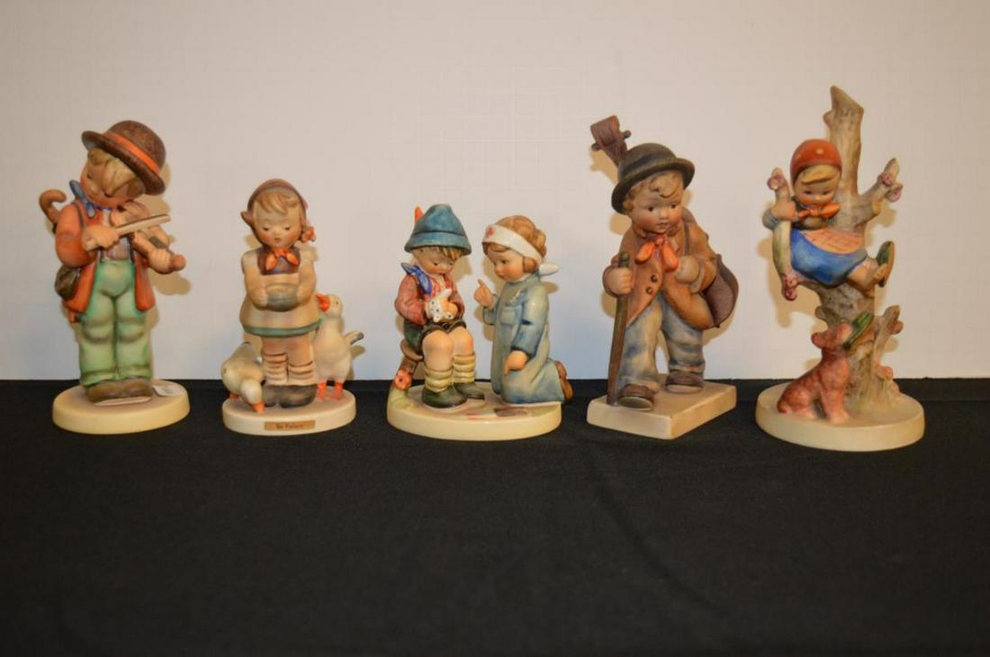 Lot Of Hummel Figurines: Lot Of Hummel Figurines. Total of 5 figurines in the lot. Consists of Little Fiddler #2/0 Tmk 5. Stands 6" tall. Be Patient #197/2/0 Tmk 4. Stands 4 1/2" tall. Little Nurse #376 Tmk 6. Stands 4" tall.