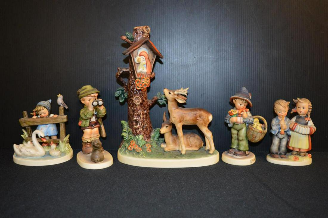 Lot Of Hummel Figurines: Lot Of Hummel Figurines. Total of 5 figurines in the lot. Consists of Forest Shrine #183 Tmk 6. Stands 9" tall. Easter Greetings #378 Tmk 5. Stands 5 1/4" tall. Birthday Serenade #218/210 Tmk 3. Stand