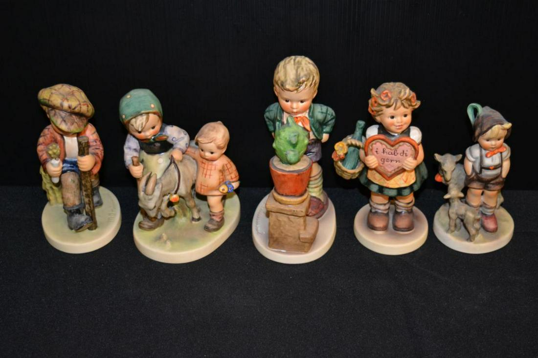 Lot Of Hummel Figurines: Lot Of Hummel Figurines. Total of 5 figurines in the lot. Consists of Little Goat Herder #200/0 Tmk 3. Stands 4 3/4" tall. Confidently #314 Tmk 5. Stands 5 3/4" tall. On Secret Path #386 Tmk 6. Stands