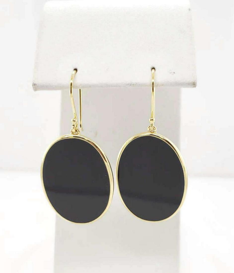 18kt Ippolita Rock Candy Onyx drop earrings: Ladies 18kt yellow gold Ippolita Rock Candy polished oval onyx drop earrings finished with shepherd's hook posts. Length 1.5". Weight 4.1 grams.