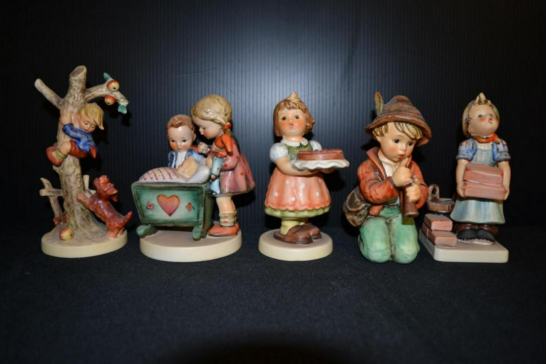 Lot Of Hummel Figurines: Lot Of Hummel Figurines. Total of 5 figurines in the lot. Consists of Birthday Candle #440 Tmk 6. Stands 5 1/2" tall. Blessed Event #333 Tmk 5. Stands 5 1/2" tall. Culprits #56A Tmk 5. Stands 6 1/4" t