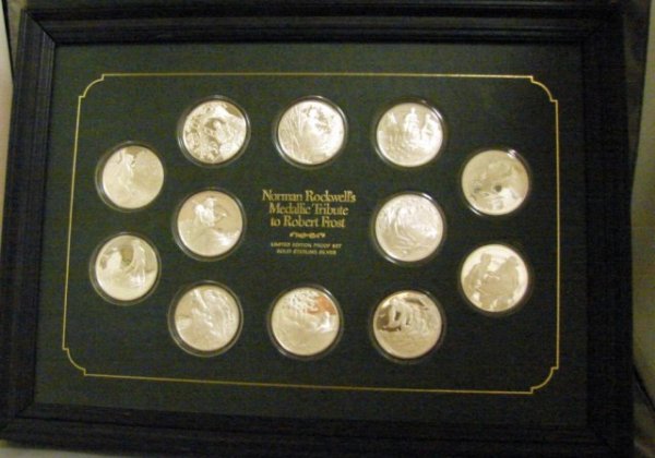 Norman Rockwell Medallic Tribute to Robert Frost: Boxed set of 12 one ounce sterling silver medallions representing Norman Rockwell's tribute to Robert Frost. In custom designed portfolio. 17" x 12"