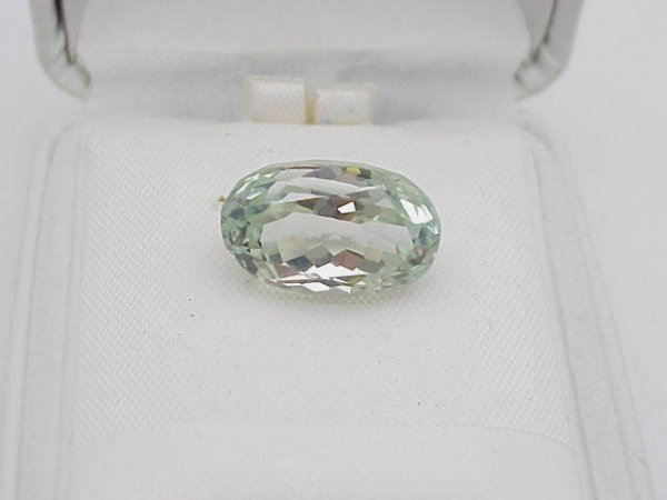 11.05ct natural seafoam green kunzite: Rare 11.05ct oval shaped natural Afghanistan green kunzite measures 16mmX10mm has good clarity, color and great cut.