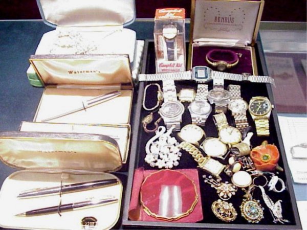 Lot of costume jewelry/pens/watches/compact: Lot of costume jewelry including several watches including original Campbells watch, Waterman pens,compact and sterling silver jewelry.