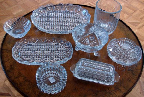 9 pieces Vintage Cut Crystal: 9 pieces Vintage Cut Crystal, including a large oval platter with a scalloped rim, covered butter dish, & several bowls. No chips or cracks.