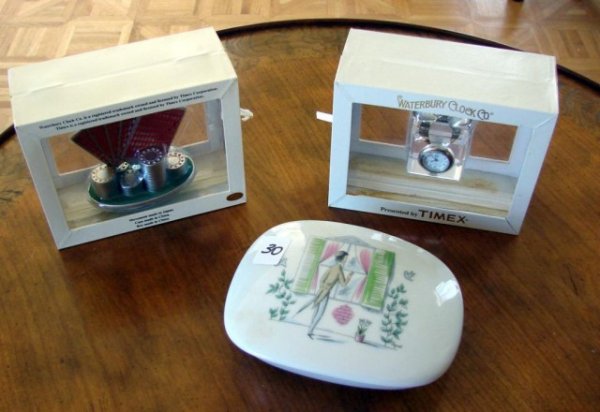 Risque Rosenthal Covered Box & 2 Timex clocks: Peeping Tom Covered Box marked Rosenthal & 2 Collectible Timex Clocks, in original boxes.
