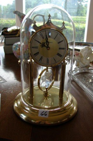 Howard Miller Clock under glass dome: Howard Miller Clock under a glass dome