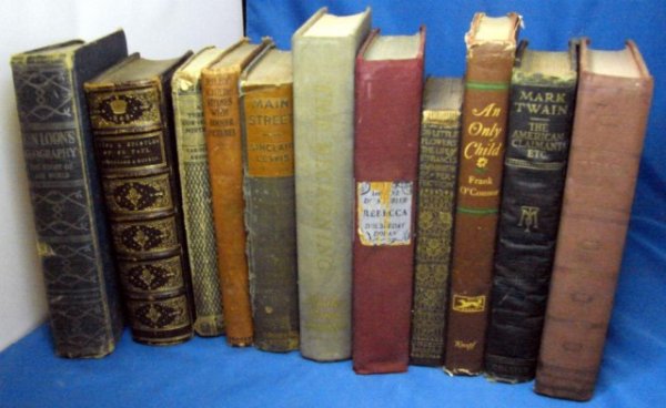 Vintage Lot of Books: Mark Twain, Sinclair Lewis+: Vintage lot of books by various authors including The Life and Epistles of St. Paul from 1873, Van Loon's Geography, Daphne Du Maurier "Rebecca", Mark Twain "The American Claimant", Sinclair Lewis Mai