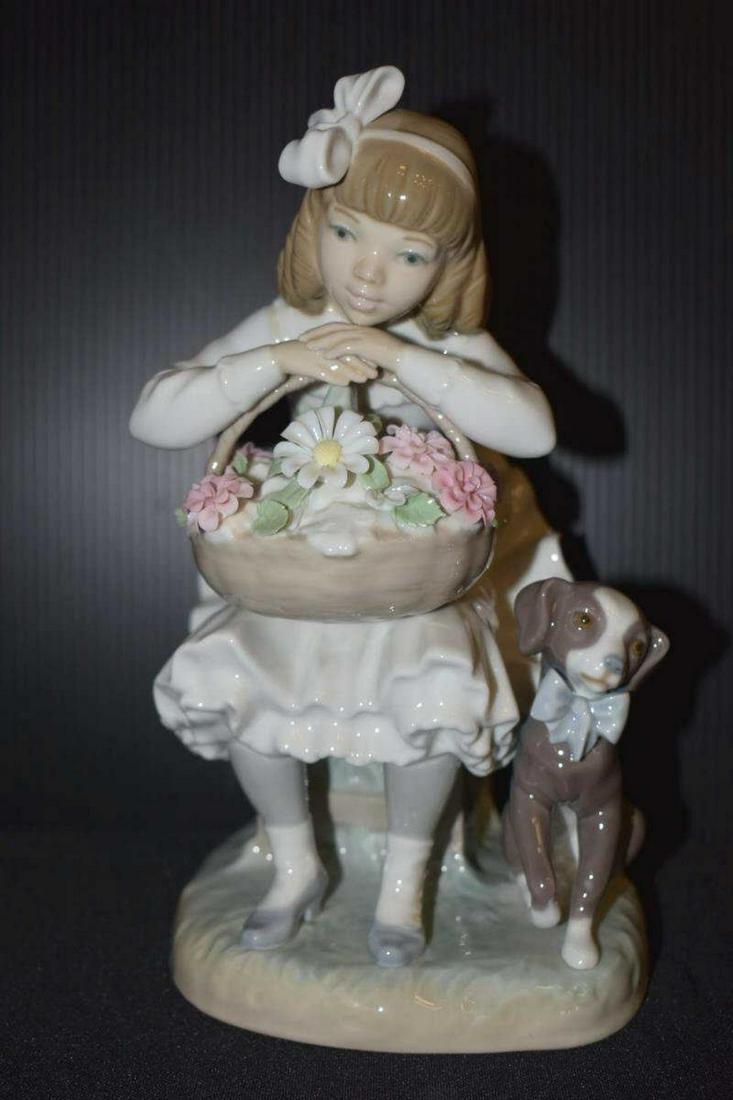 Retired Lladro Figurine Titled Girl With Flowers: Retired Lladro Figurine "Titled Girl With Flowers" Originally sculpted in 1969 & retired in 1989. It is in the glazed finish, #1088. Sculpted by Antonio Ballester. 8.25" tall. A depiction of a young l