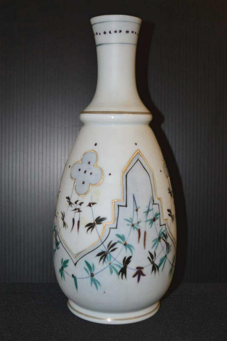 Vintage Bristol Glass Hand Painted Floral Vase: Vintage Bristol Glass Hand Painted Floral Vase. White base color with light blue areas with hand painted floral designs. 10" tall, 4" diameter. Narrow neck & opening. Obvious hand blown pontil mark on