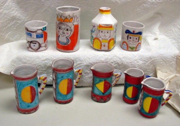 6 DeSimone Signed Pottery Pitchers, 1 jug, 3 vases: 6 pieces of DeSimone Pottery - 6 pitchers, 1 jug, and 3 open jars (2 are marked inside). Individually hand crafted and hand painted with unleaded colors, De Simone pottery adds cheerful flair and styl