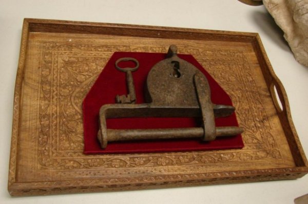 Large Antique Lock for Spanish Dungeon: Large Antique Lock for Spanish Dungeon mounted in ornae frame. Lock is 10" long; frame is 21" x 14"