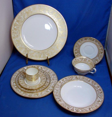 48 pcs. Wedgwood Gold Florentine China: Service for 6 in Wedgwood Gold Florentine, 6 ea. dinner, salad, bread & butter plates (10 3/4", 8" and 6"), 12 ea. cups & saucers, 12 rimmed soups 8", and 6 demitasse cups and saucers. All pieces in e