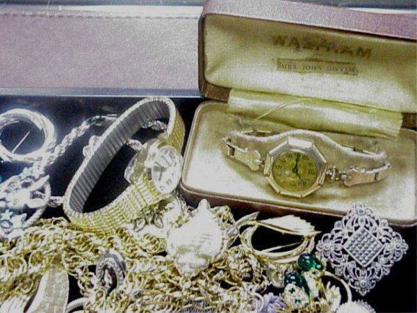 Lot of costume jewelry Trifari,sterling: Lot of costume jewelry including Trifari,Lucerne watch, quartz watches, sterling, rosary with container and vintage lady's Waltham watch and much more.