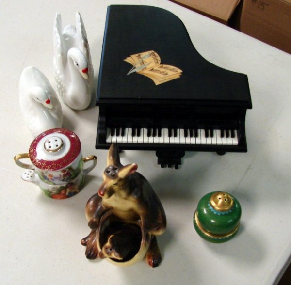 Lot of Salt & Peppers incl. Kangaroo & Music Box: Lot of salt & pepper shakers including a pair of swans and a kangaroo with her joey, cloisonne cup, and a Piano music box playing Beethoven Symphony No. 5