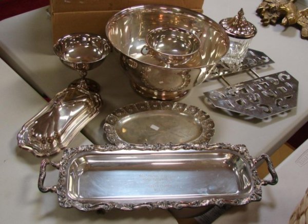Lot of Silver Plate Serving Pieces: Lot of Silver Plate Serving Pieces, including large and small bowls, trivet, bread tray, condiment server and butter dish with glass insert.